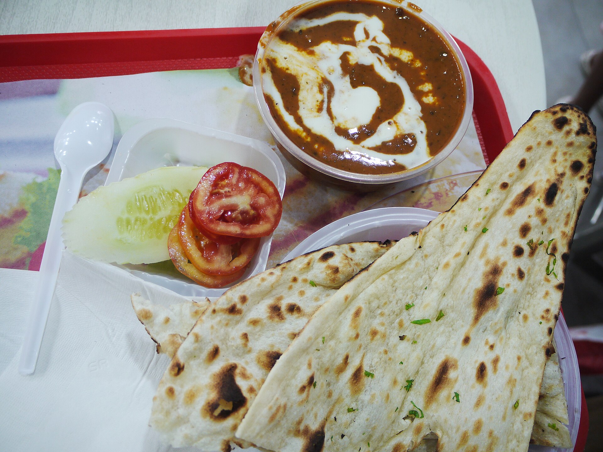 Dal makhani served with naan.